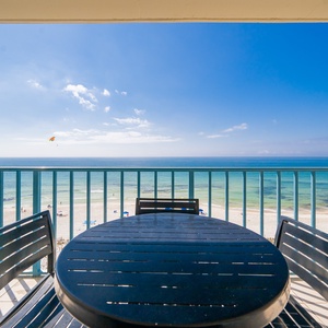 Your balcony invites you to watch colorful parasails drift across endless blue skies over the calm gulf coast