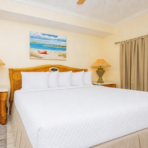 Retreat to the king master suite with cozy bedding after a day of adventure and drift off into a peaceful slumber