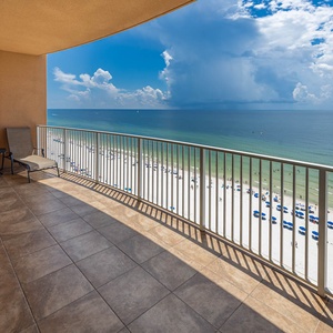 Step onto your balcony and enjoy breathtaking views of the water and beach below