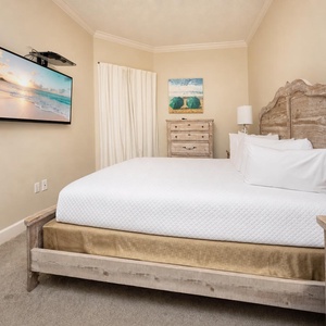 Sink into the plush king bed, streaming your favorite shows for a cozy night in this guest suite