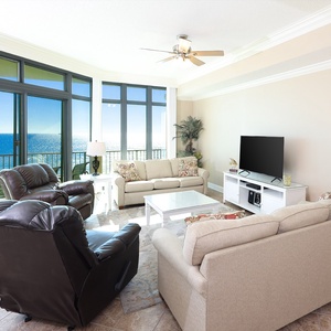Relax in the cozy family room, equipped with a queen sofa sleeper, while enjoying stunning views of the coast