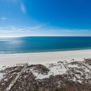 Relax with the sparkling waters and expansive shoreline, ideal for leisurely strolls and beachside enjoyment