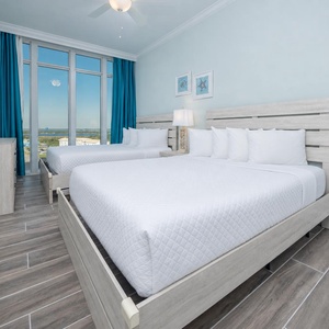 Enjoy expansive coastal views from this queen guest suite with coastal accents and stylish design
