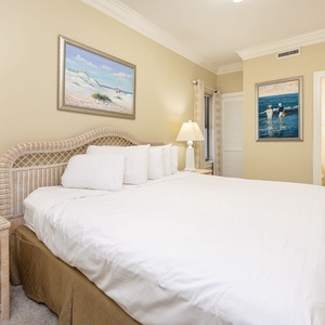 Retreat to this inviting guest bedroom featuring a king bed, tasteful decor, and soft lighting for a restful stay
