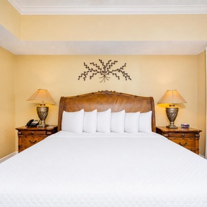 Unwind after a day at the beach in this elegant king master suite surrounded by stylish coastal accents