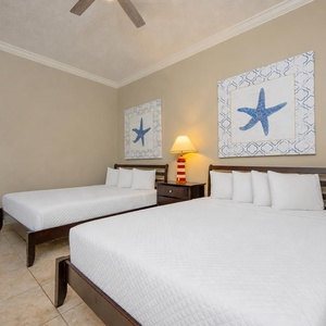 Sink into the soft, queen beds in this cozy guest suite, perfect for restful nights after a day of beach fun