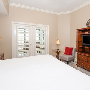 Relax after a fun beach day and enjoy a good movie from the cozy king bed in the master suite
