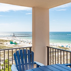 Relax on your balcony while enjoying expansive views of the coastline and vibrant beach activities