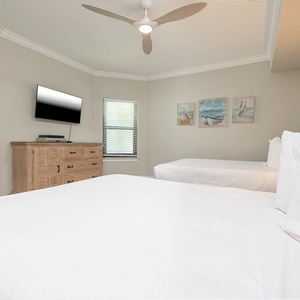 Unwind in this queen guest suite and stream your favorite shows or enjoy a good movie after a fun vacation day