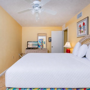A guest suite invites you to unwind on the soft queen bed while streaming your favorite show