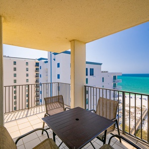 Balcony seating overlooks the beach, offering a serene spot to enjoy the stunning gulf views and gentle sea breeze