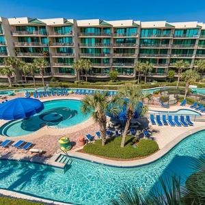 Soak in vibrant poolside vibes from your spacious balcony, inviting you to unwind and enjoy the coastal atmosphere