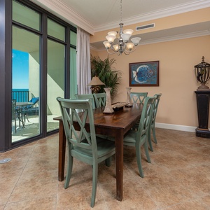 Gather around the dining table and savor moments with family, admiring the views from your balcony