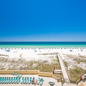 Turquoise waters meet the sky as you enjoy the peaceful rhythm of waves and seagulls overhead