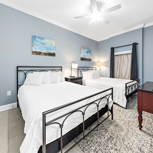 Make yourself comfortable in this queen guest suite, and stream shows on the dresser TV