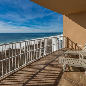 Relax on the balcony, soaking in the serene beachfront views and the refreshing coastal breeze
