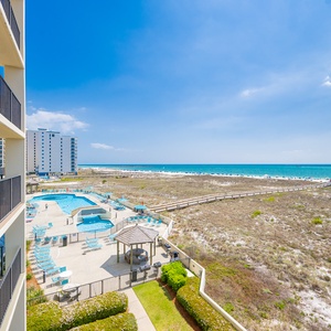 Unwind on your balcony, soaking in sunny views of the coast while keeping an eye on the sparkling pool below