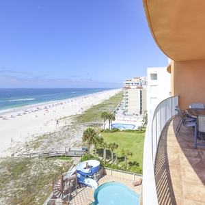 Breathe in the coastal air while relaxing on the balcony, enjoying sweeping views of the beach