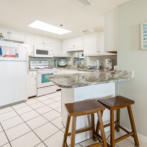Gather your family around the breakfast bar, enjoying morning coffee and planning a day of beach fun