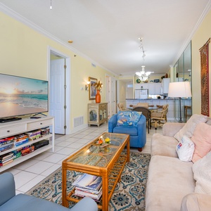 Cuddle up on the plush sofa queen in the living room while watching your favorite show on the TV