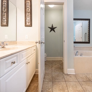 Refresh in the master bath after a day at the beach with a soothing jetted tub