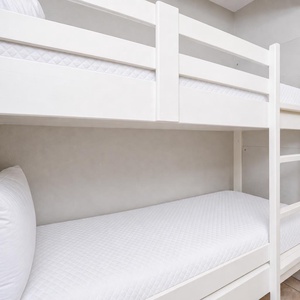 Cozy bunk area in the hallway for kids to enjoy relaxing after a day of adventure