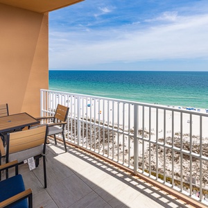 Soak up gulf views from the balcony table while listening to waves and watch the horizon disappear into the sky