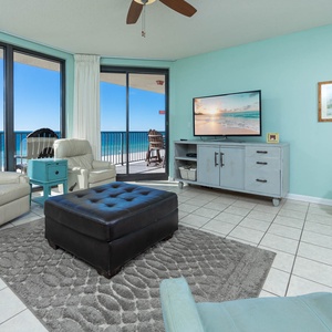 Relax in the inviting living area with comfortable seating and a view that brings the outdoors in