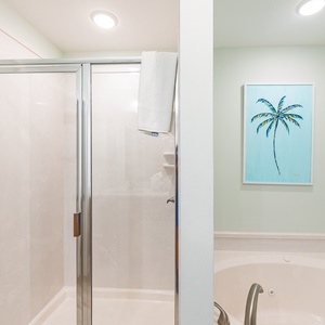 Indulge in relaxation in the master bath with a refreshing walk-in shower and soothing jetted tub