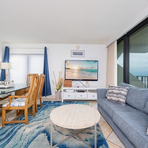Relax on the comfortable sofa with a queen sleeper, savoring quality time as you enjoy views of the coast