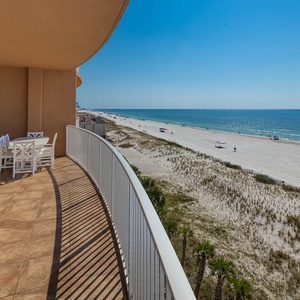 Enjoy meals at the outdoor dining table while taking in the expansive views of the shoreline