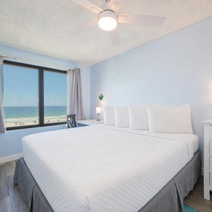 Drift into a restful sleep in the king master suite, with serene coastal views just outside your window