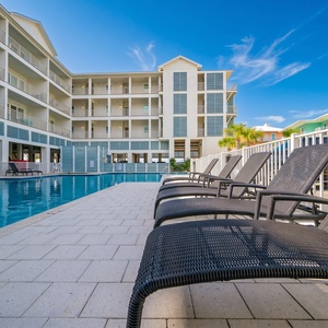 Lounge by the pool after a long beach day and relax