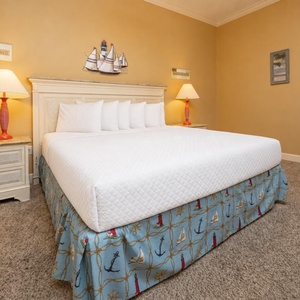 Drift into restful sleep on a cozy king bed in this guest suite, surrounded by soothing decor that enhances your getaway