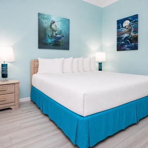 This king bed suite invites you to sink in and rest after family beach days