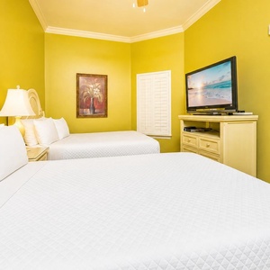 Unwind in this guest suite with two double beds after a day along the coast