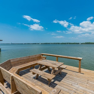 Relax on the wooden deck with picnic seating and have a peaceful moment or catch the biggest fish of the day