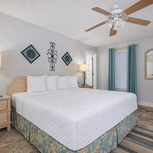Enjoy relaxation in the king master suite, surrounded by calming decor and inviting natural light from the window