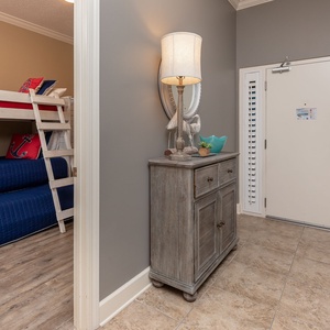 Welcoming entryway to your vacation rental with coastal accents inviting you to explore your beachfront retreat
