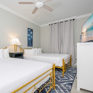 Unwind in this queen guest suite and stream your favorite shows or enjoy a good movie after a beach day