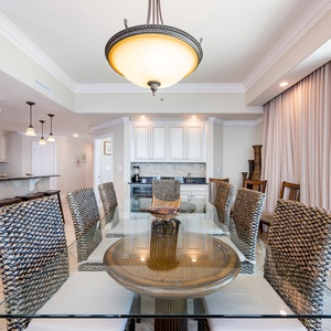 Gather around the elegant dining table, enjoying the warm vibe as laughter fills the air during family game night