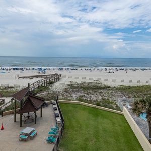 Enjoy the beautiful beach view from your private balcony, perfect for relaxation and soaking in the coastal ambiance