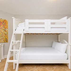 Delight in playful nights in this cozy bunk room with twins, where adventures await after fun-filled days at the coast