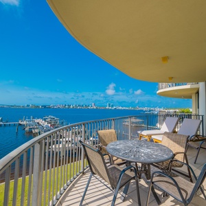 Breathe in the fresh air on the spacious balcony while gazing at the vibrant waterfront views