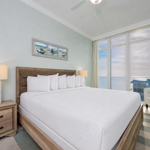Feel the calm wash over you in the king guest suite as you gaze through tall windows at the shimmering coast