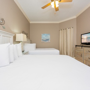 Unwind in this queen guest suite and stream your favorite shows or enjoy a good movie after a beach day