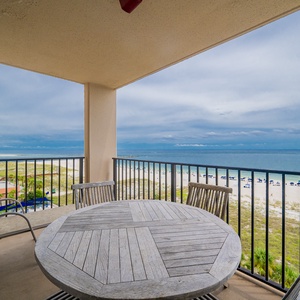 Relax while enjoying views of the beach and gentle waves from your spacious balcony