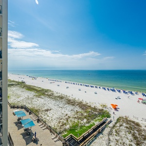 Enjoy stunning views from your balcony, where you can relax and take in the beauty of the tranquil waters and beach below