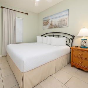 Drift into restful slumber in this king guest suite, complete with soft bedding and coastal-inspired decor