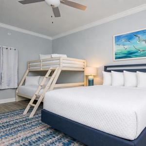 Unwind in this guest room with a queen bed and a twin over full bunk for a restful night